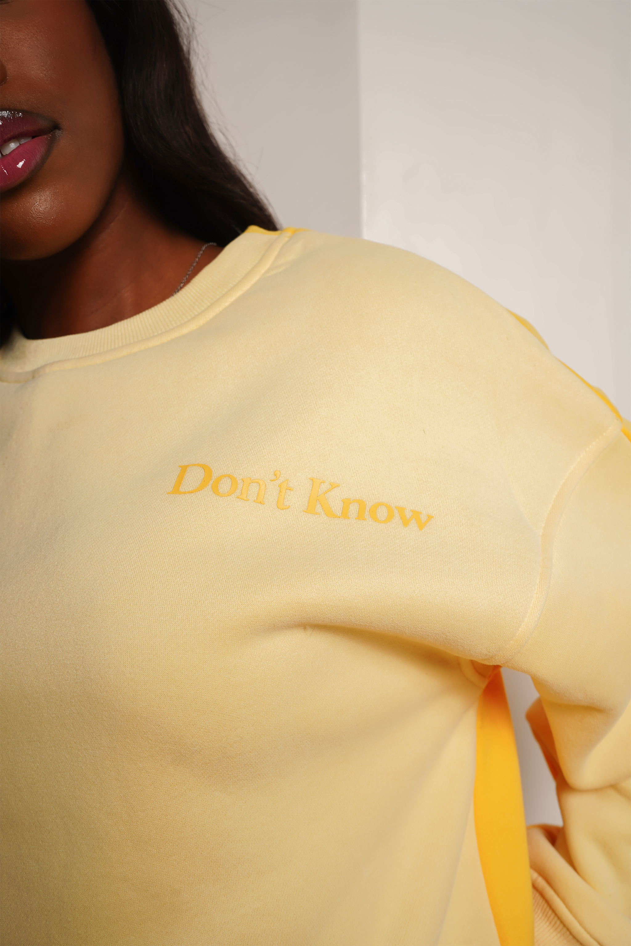 don't know don't care yellow crewneck sweatshirt